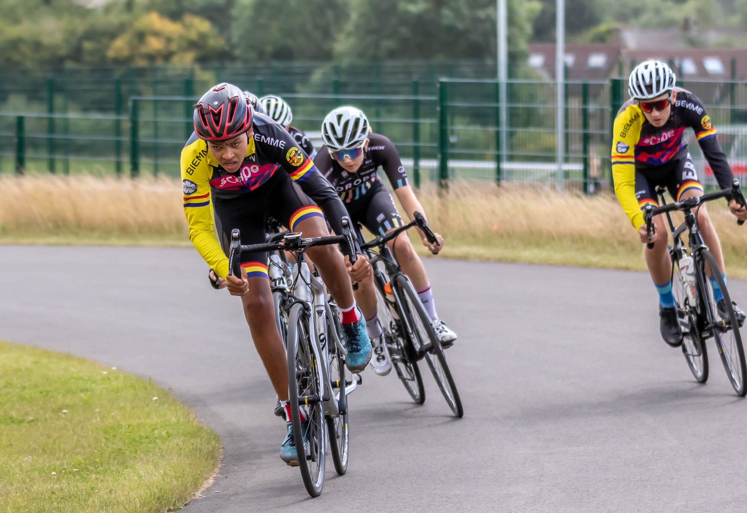 Cyclists in lycra and helmets competing in a cycle race